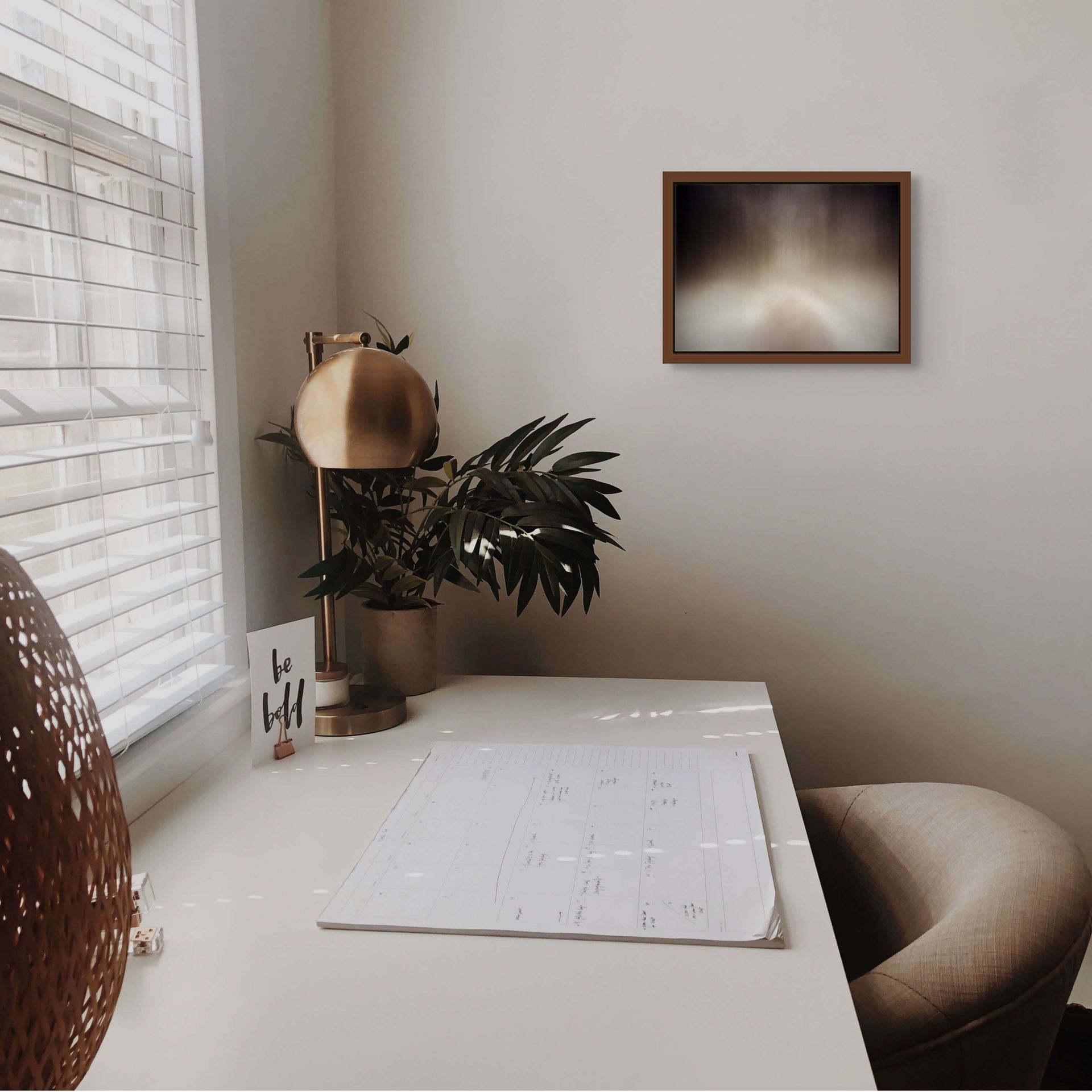 Hypnotizing fine art photograph of a long exposure taken at dusk in the woods. Framed and hung on the wall in a calming interior.