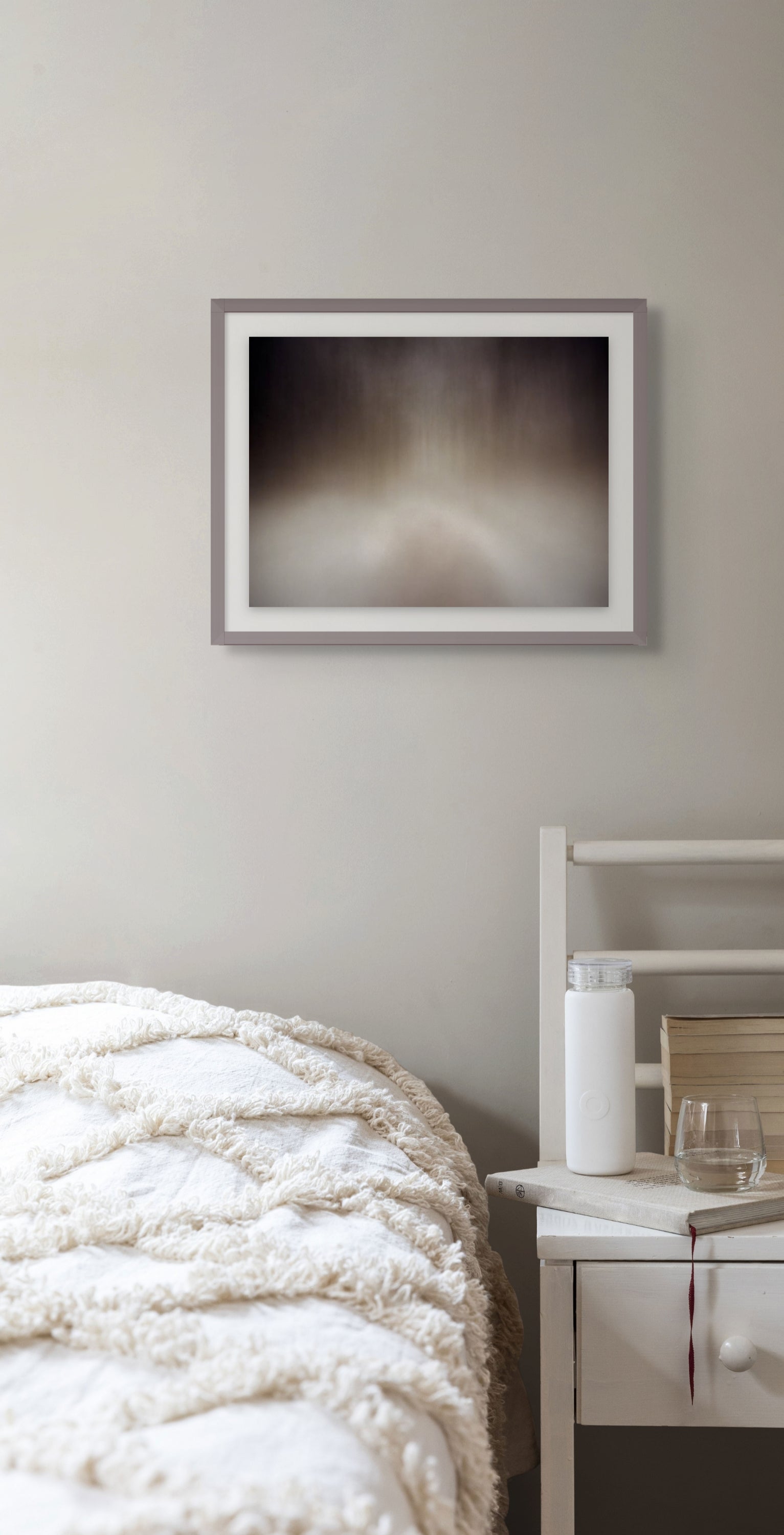 Hypnotizing fine art photograph of a long exposure taken at dusk in the woods. Framed and hung on the wall in a calming interior.
