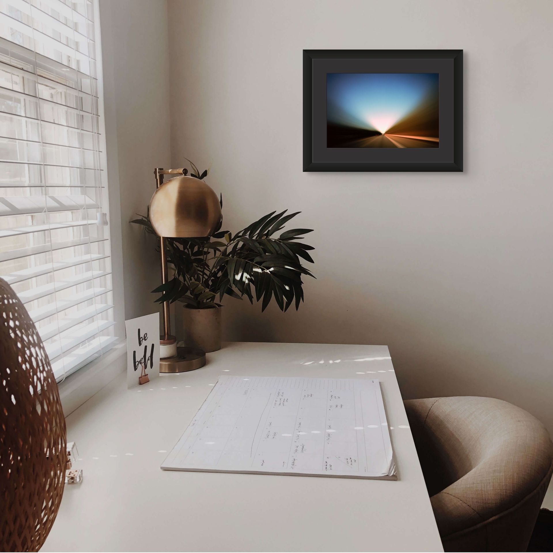 A framed fine art photo print on giclee paper hung on the wall of a modern design interior.