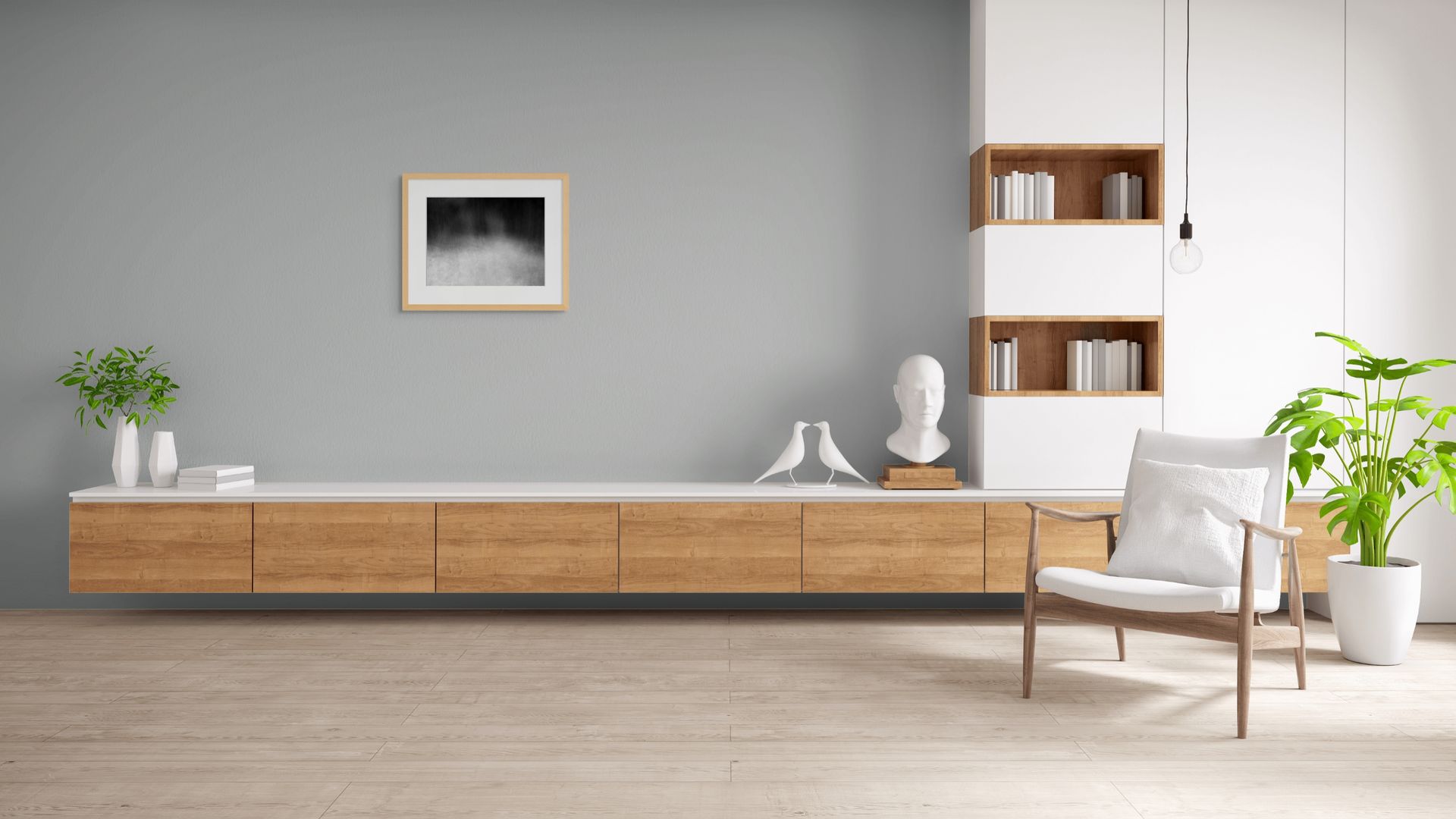 An abstract photo of the woods shot in black and white, framed and hanging on the wall of cool modern living room.