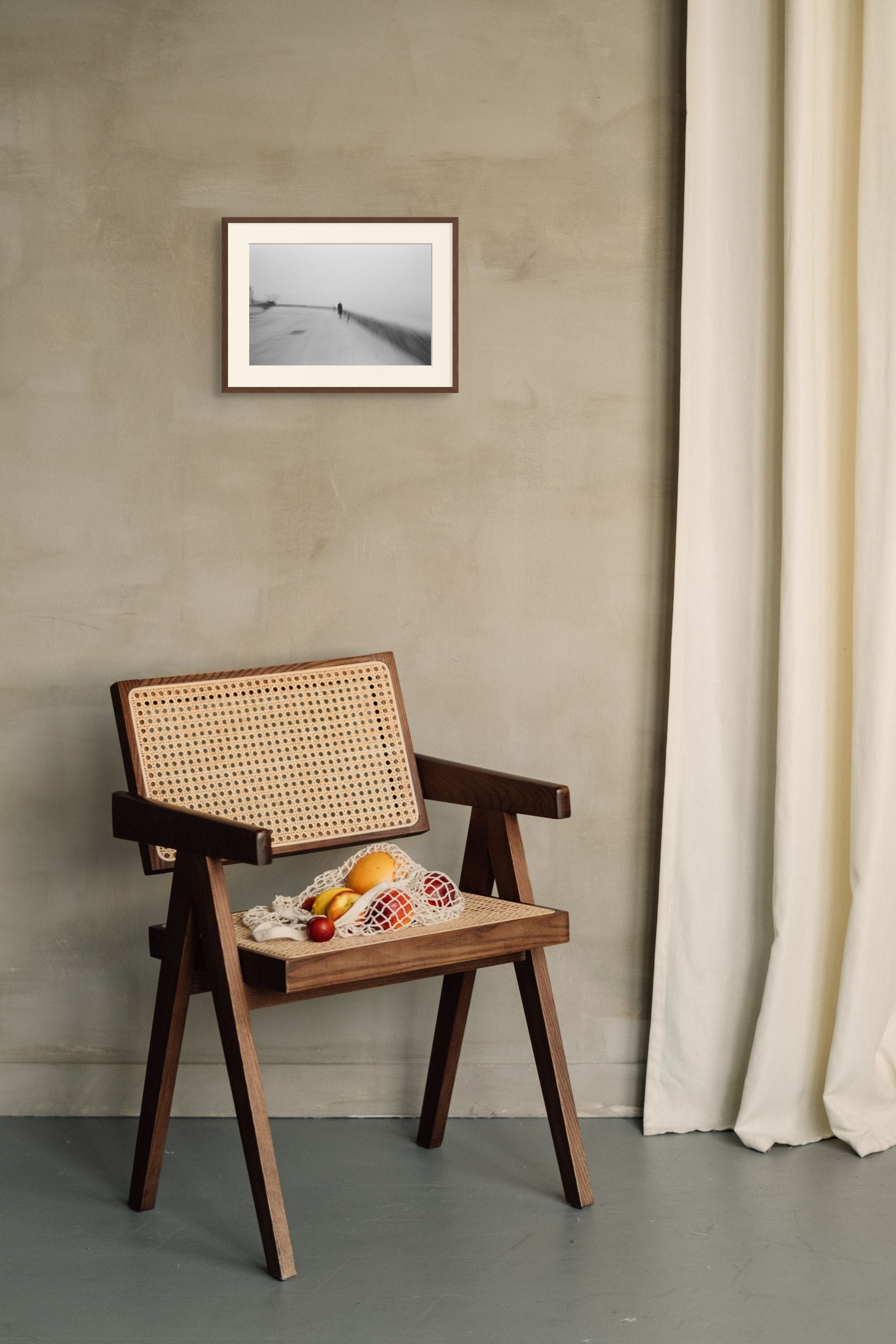 Interior design modern living room featuring a stylish black and white abstract photo.