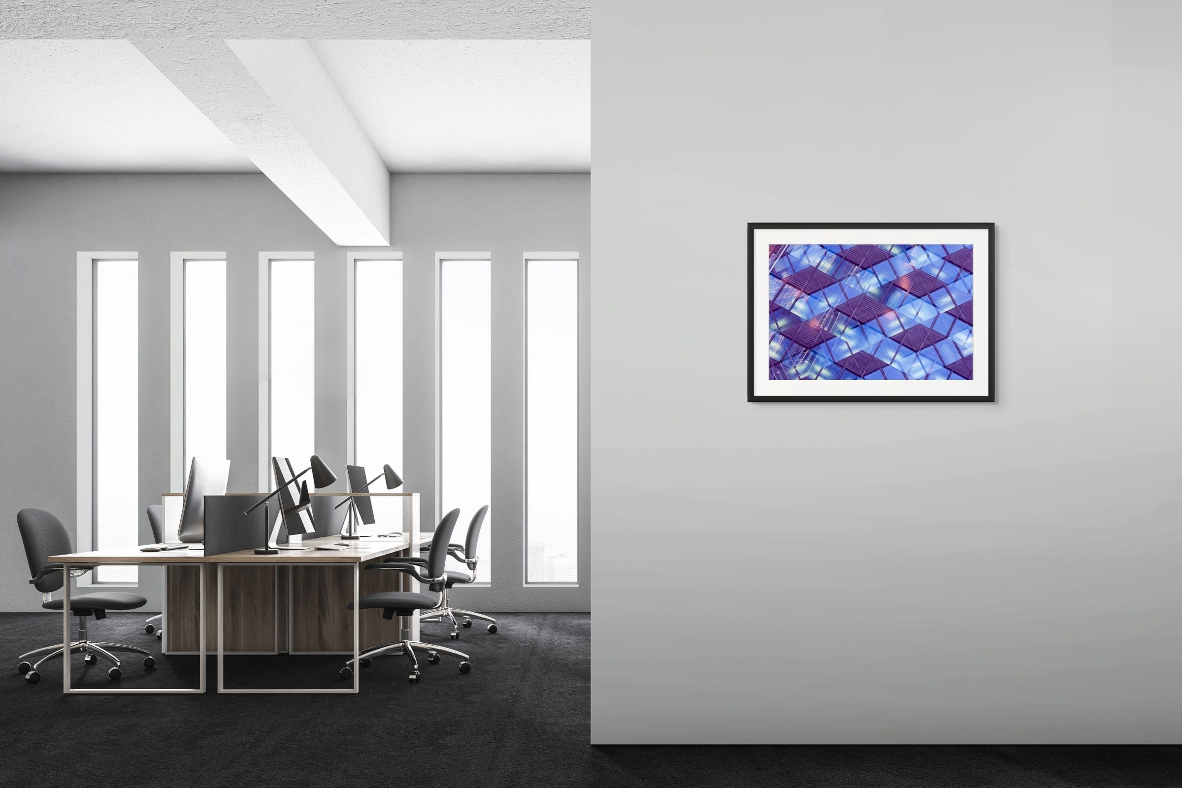 Abstract photo of an office building in Oslo, Norway. It's hanging on the wall of a small hotel office.