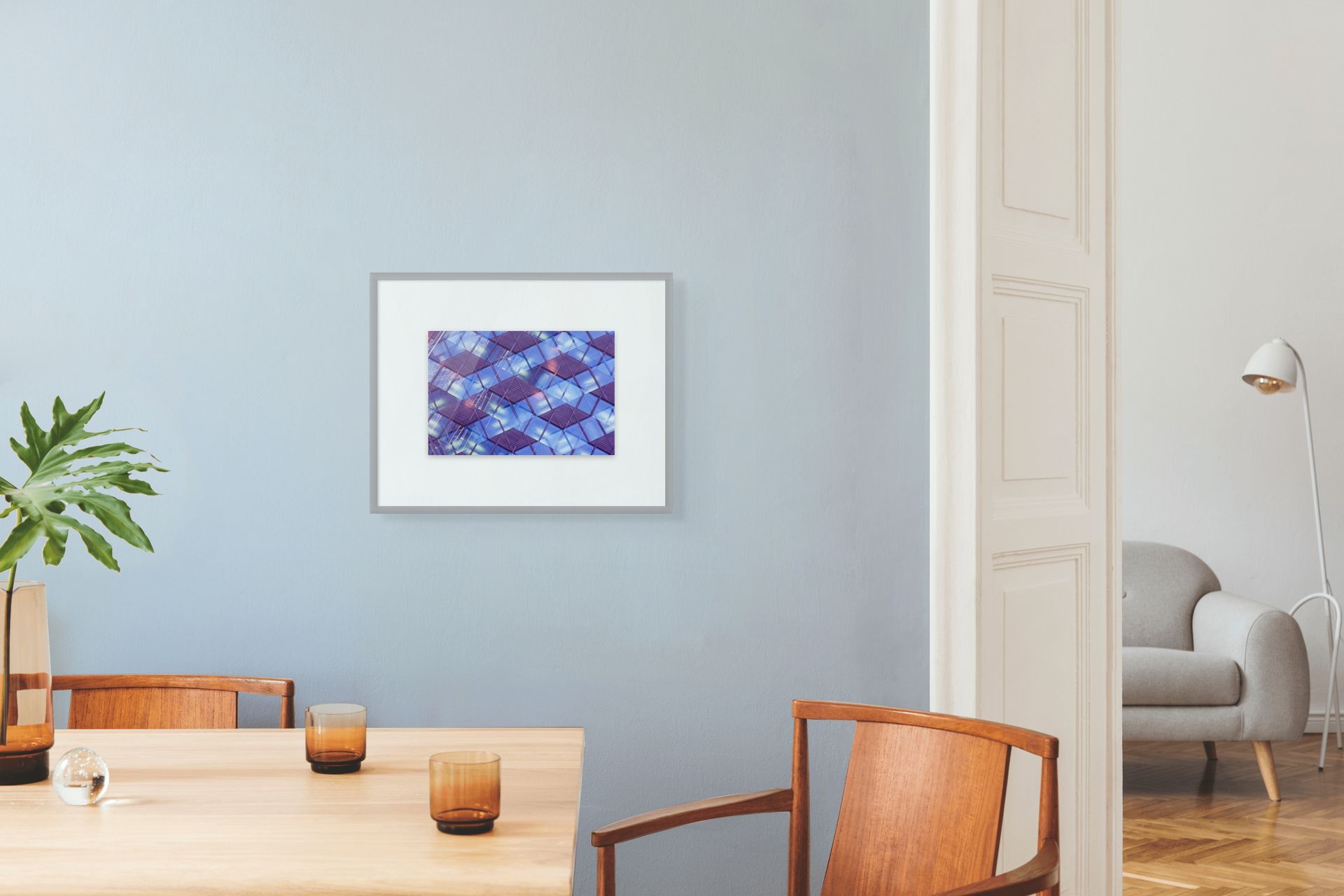 Abstract photo of an office building in Oslo, Norway. It's hanging on the wall of a dining room.