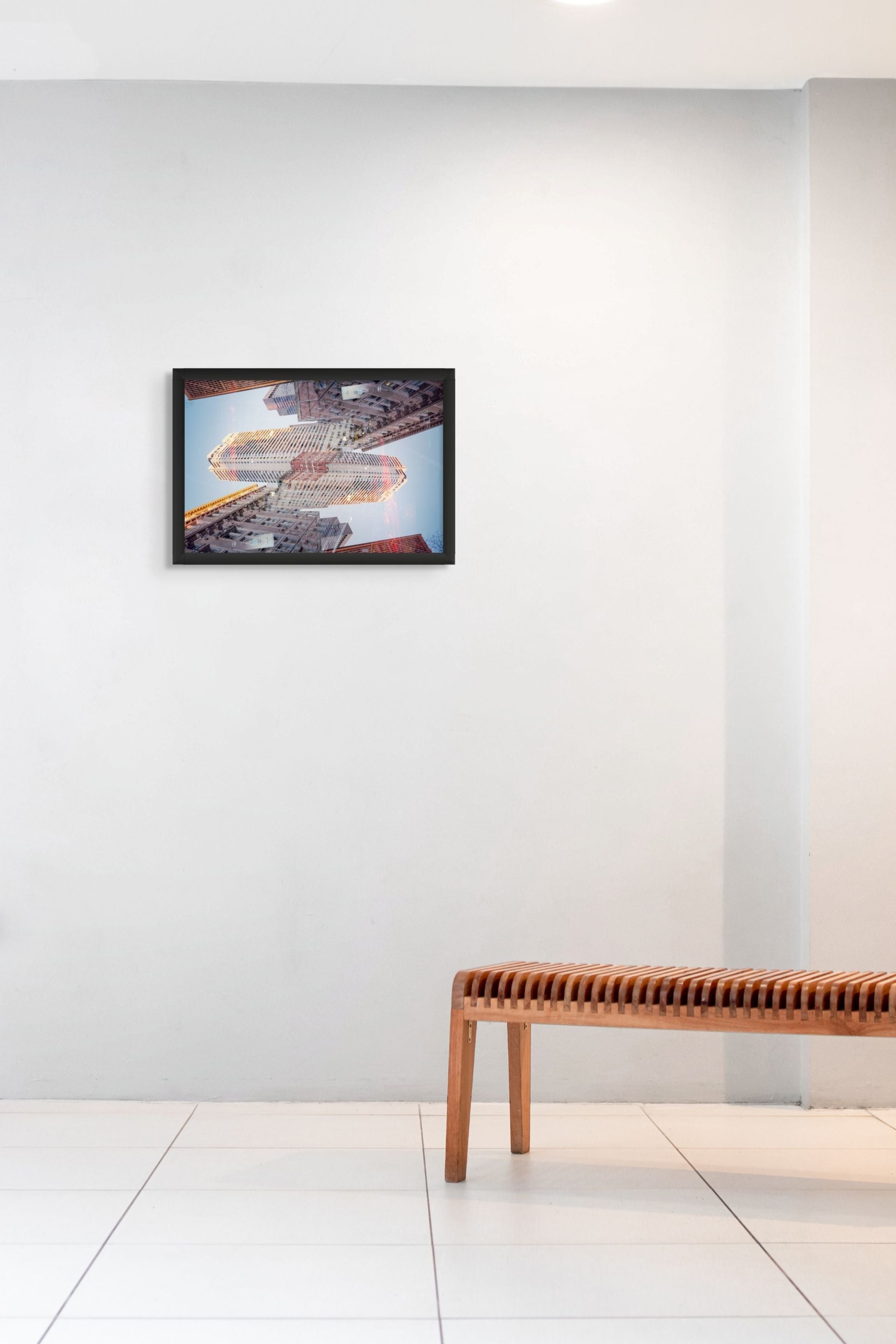 Abstract fine art photo print hanging in a gallery interior.
