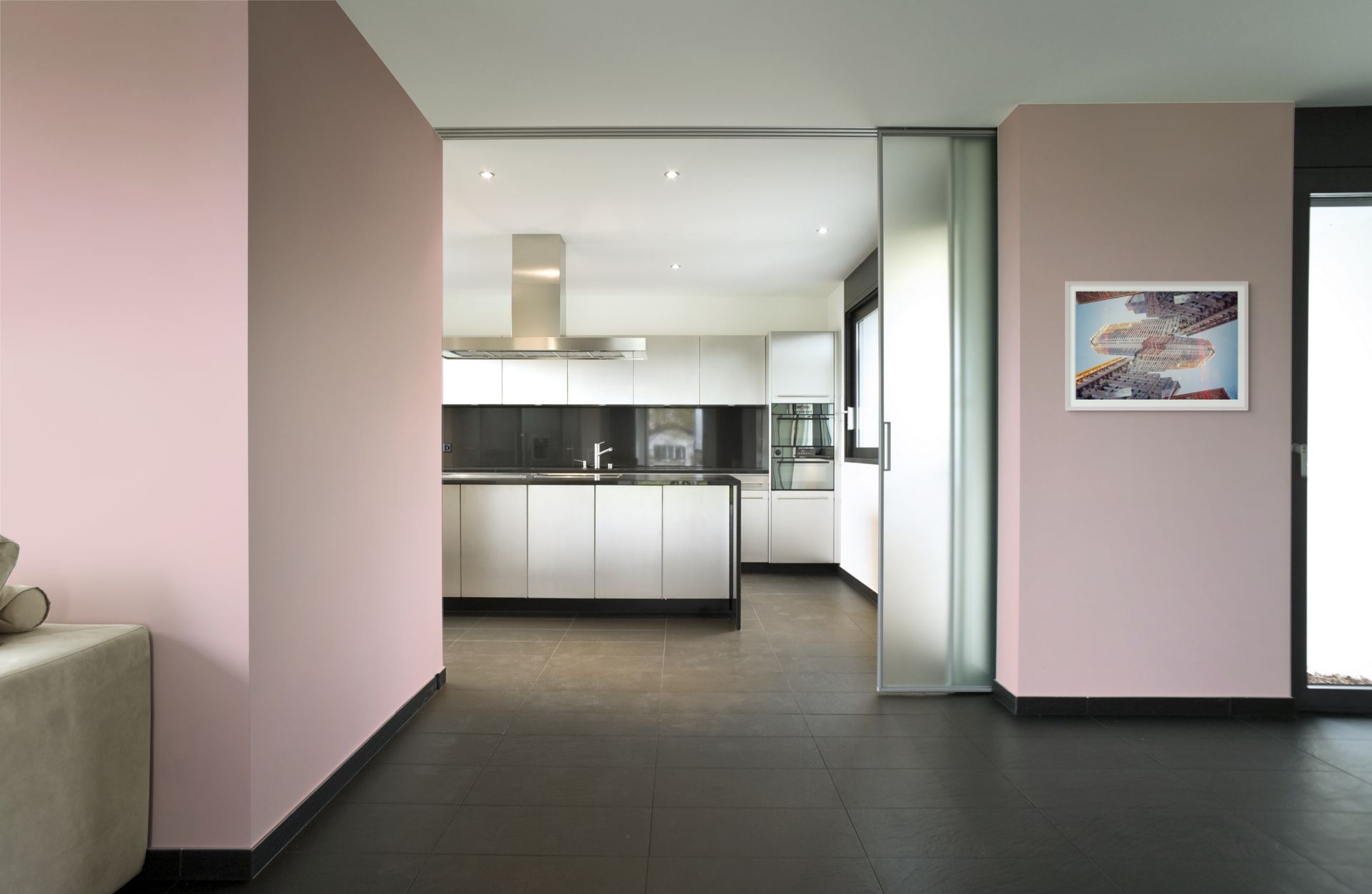 Abstract fine art photo print hanging outside a modern kitchen interior.