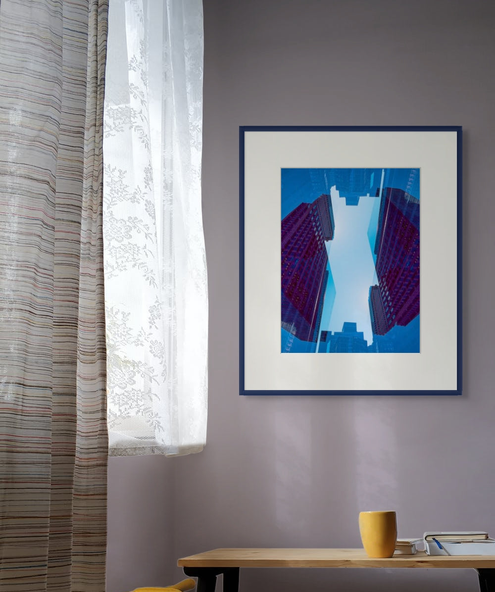 Beautiful blue abstract photo designed to work well in many interiors. It hangs on the wall of a office interior.