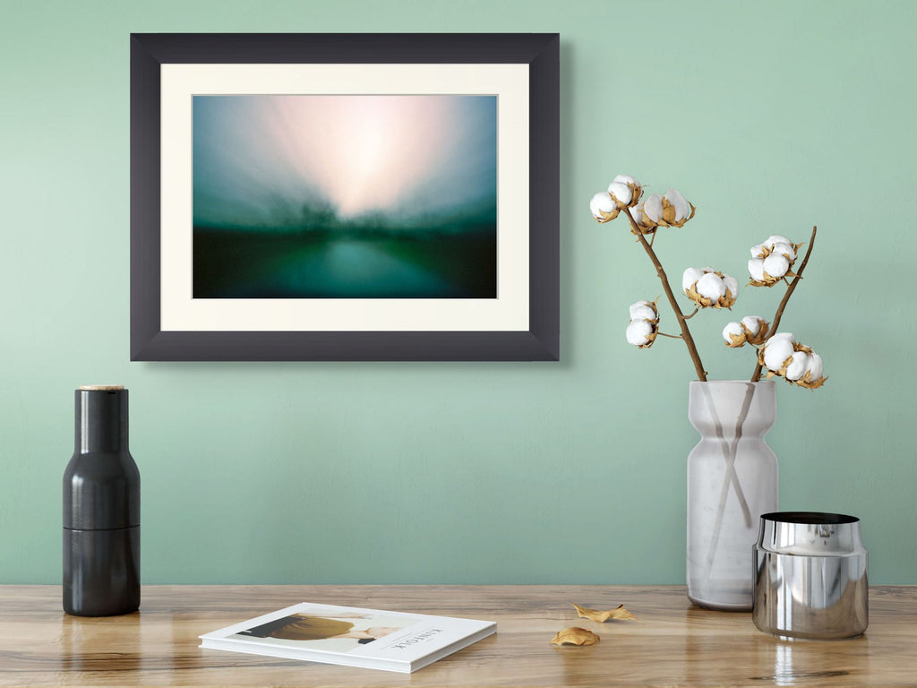 Modern, abstract photography framed and hung on the wall, in a beautifully designed office interior.