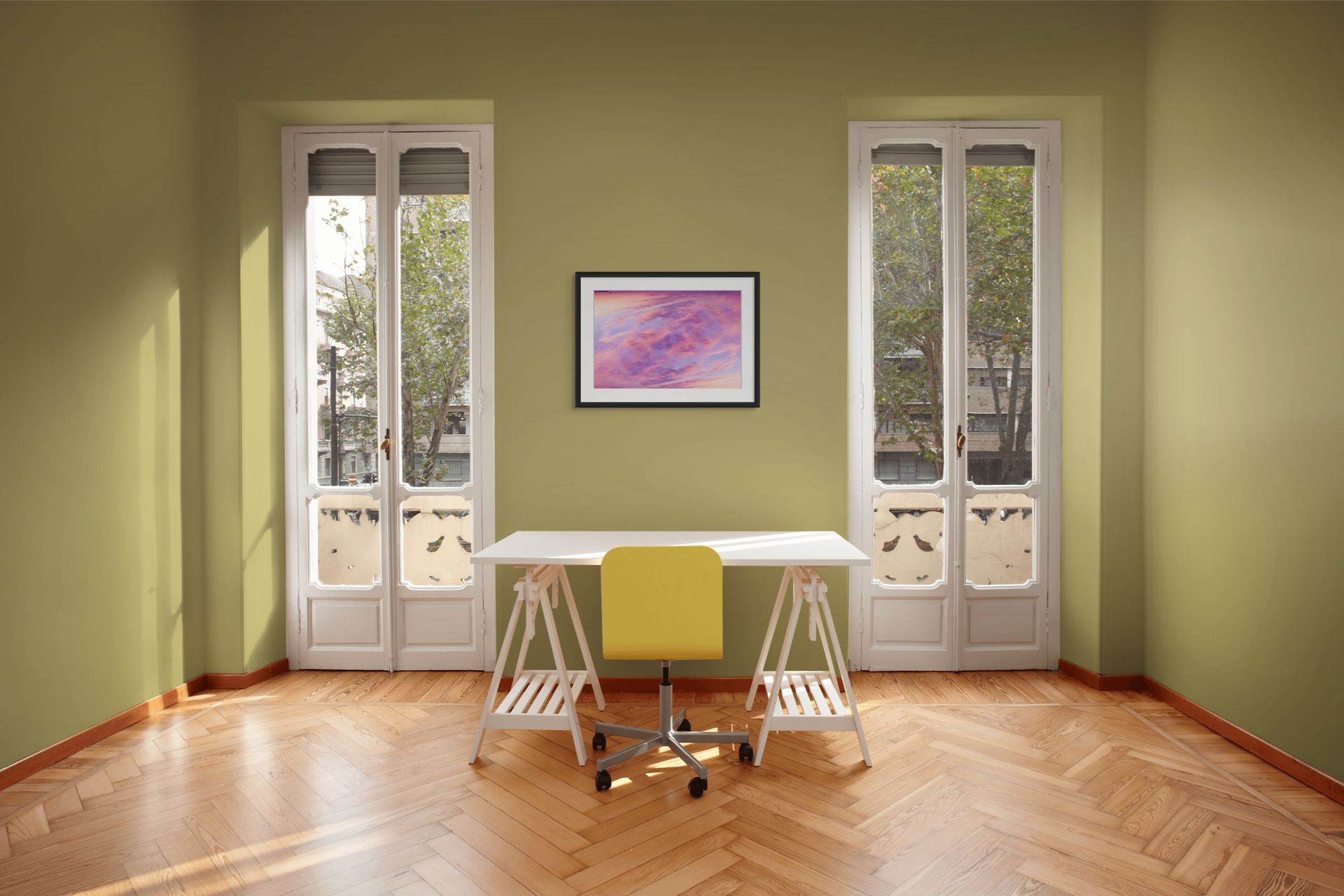 A splash of color in the form of an abstract fine art photograph depicting a double exposure of a sunset sky over cape cod. It is framed and hung on the wall of a sleek interior.