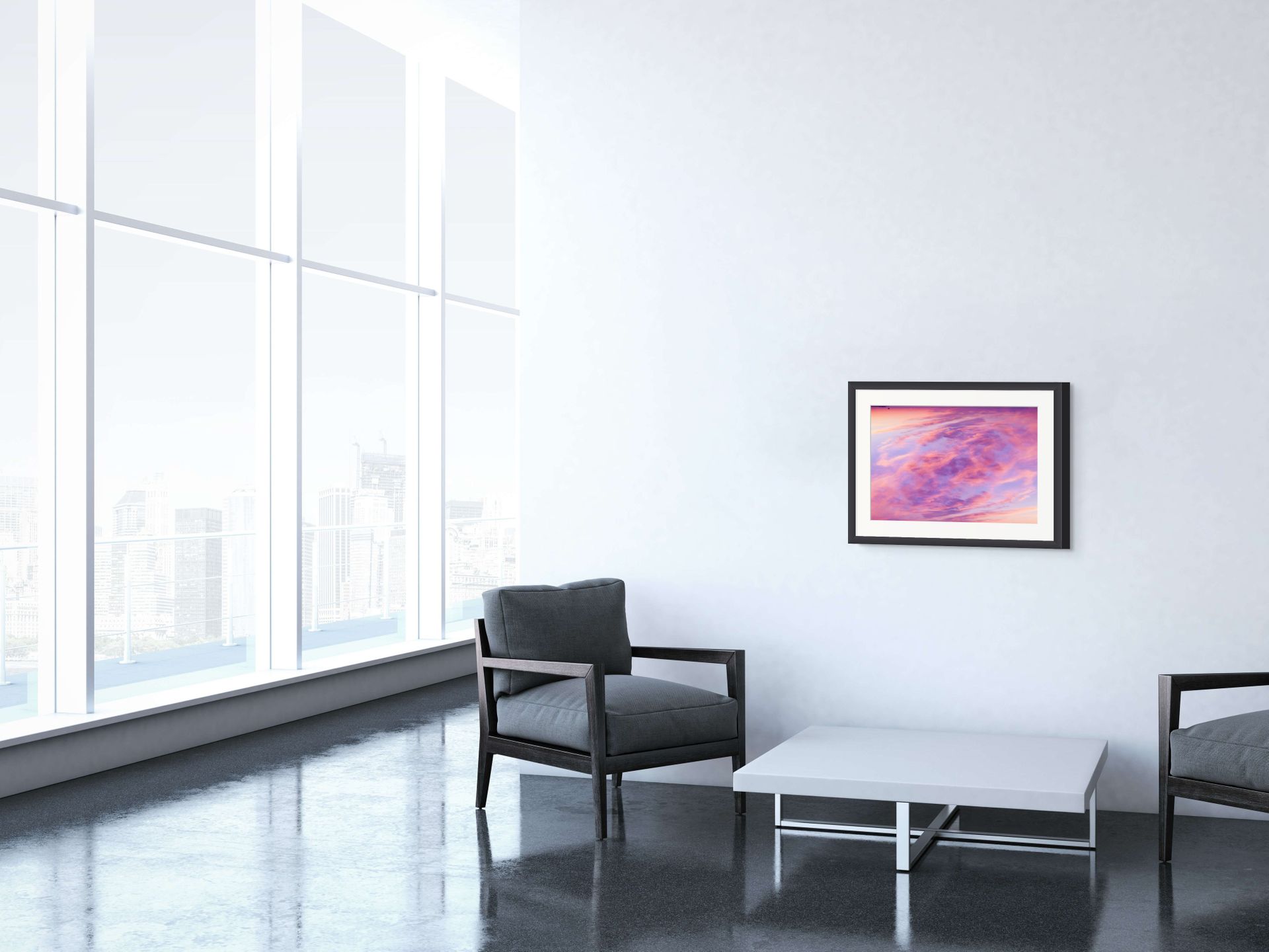 A splash of color in the form of an abstract fine art photograph depicting a double exposure of a sunset sky over cape cod. It is framed and hung on the wall of a sleek interior.