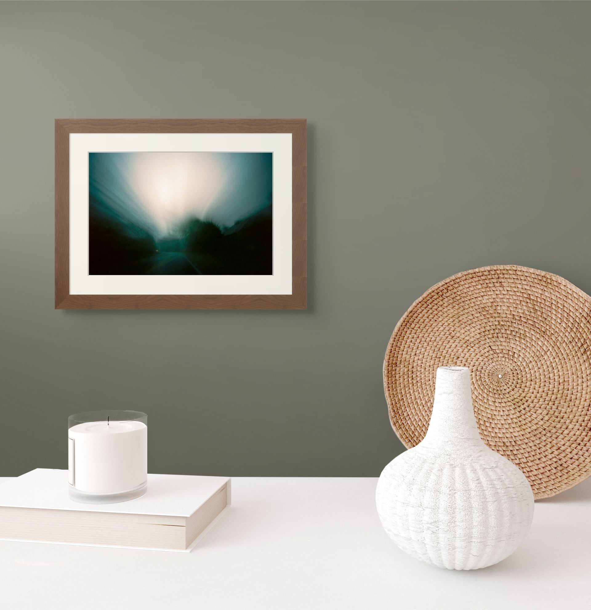 A framed fine art print of abstract long exposures photographs done at dusk on the road.