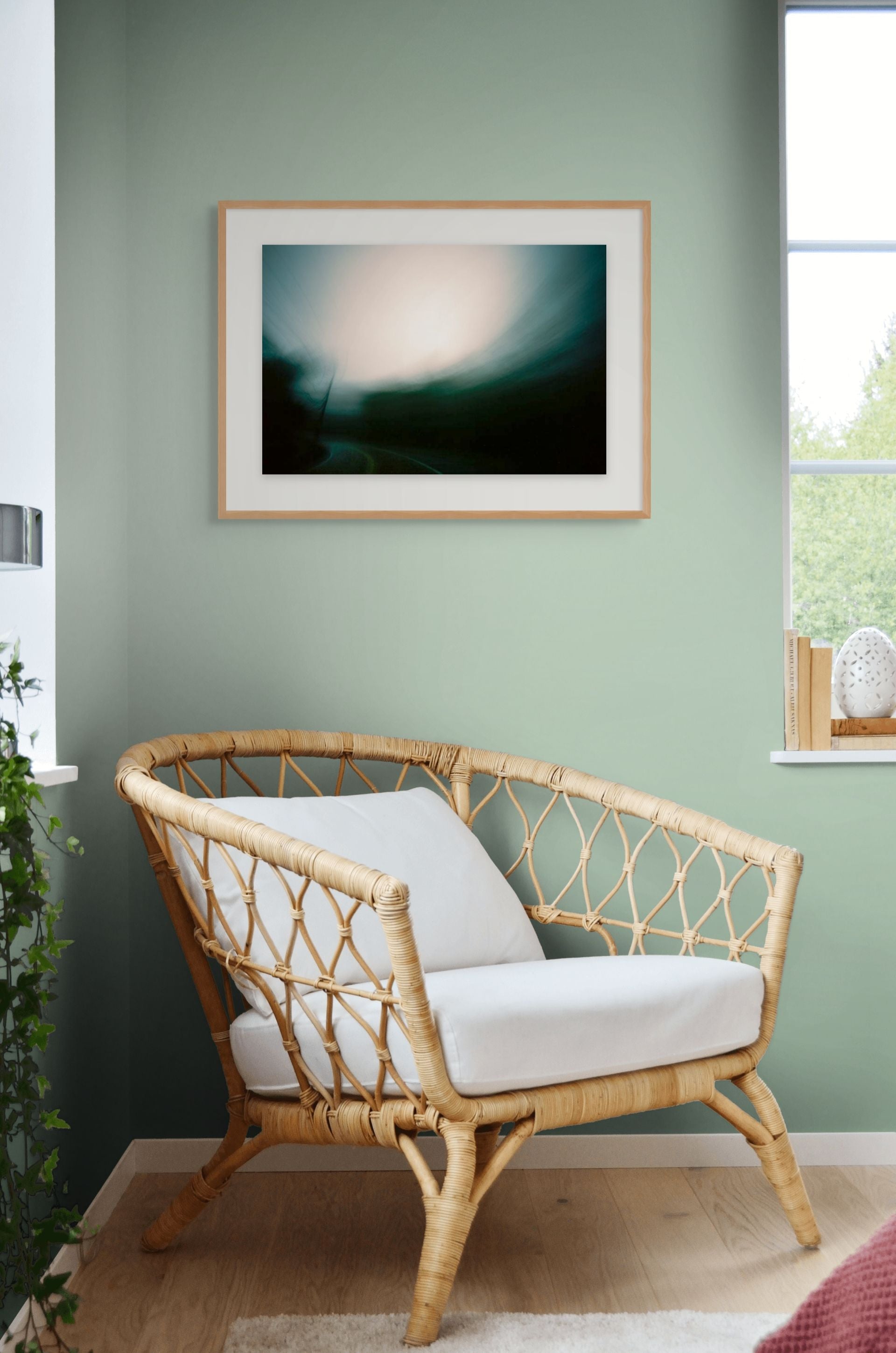 Green and black abstract photo of a road at dusk, framed and printed on high quality giclee paper in a perfectly designed room.