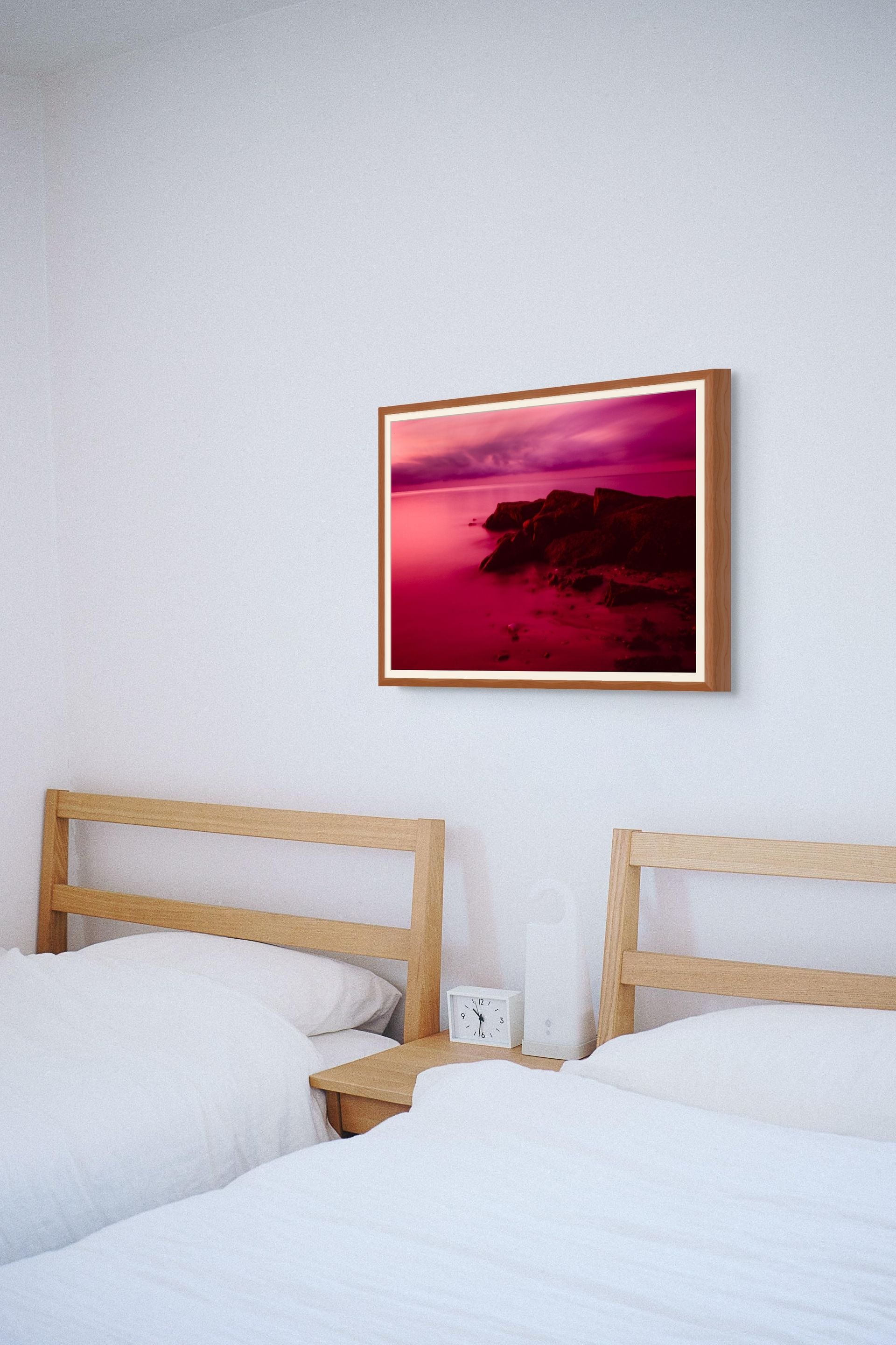 Framed Fine art print of a sunrise over cape cod with vibrant pinks and purples, perfect to add a splash of color to a beautifully designed room.