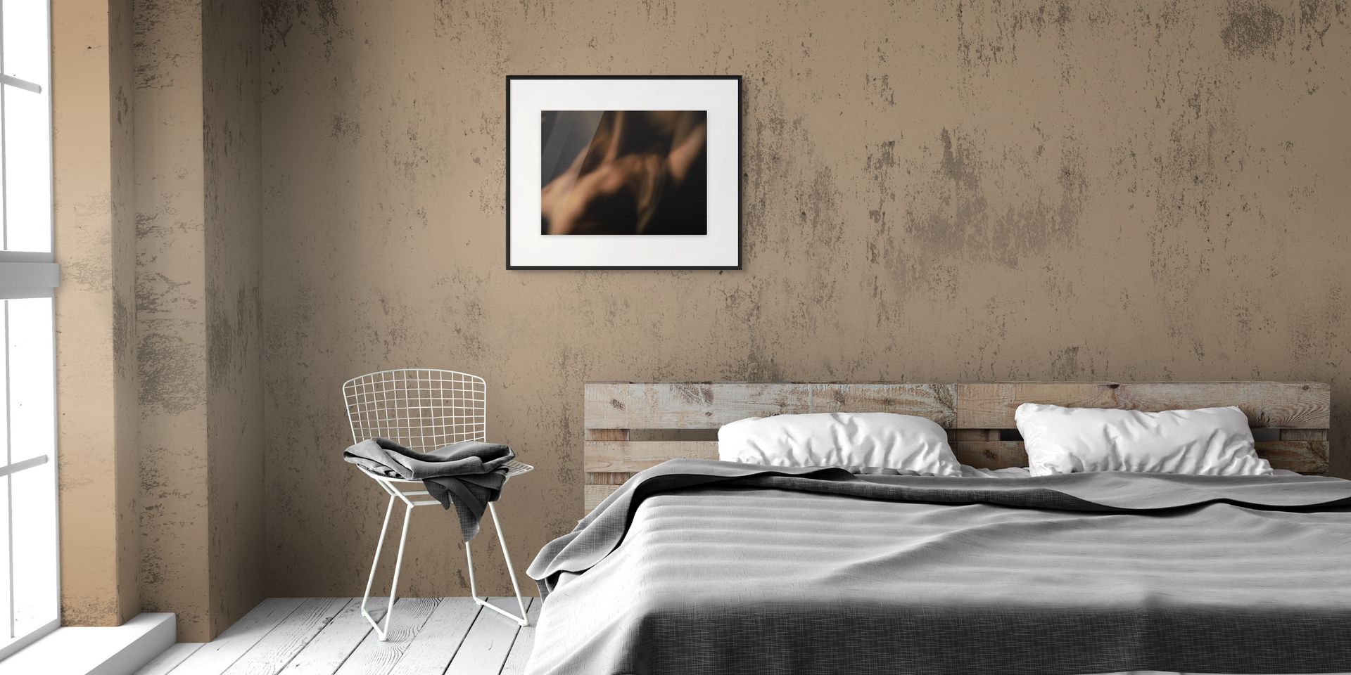 Abstract photo long exposure hanging on the wall of a bedroom.