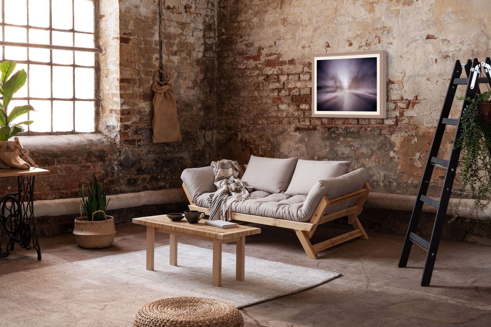 An abstract fine art print of a snowy landscape, framed and hung on the wall of a modern space.