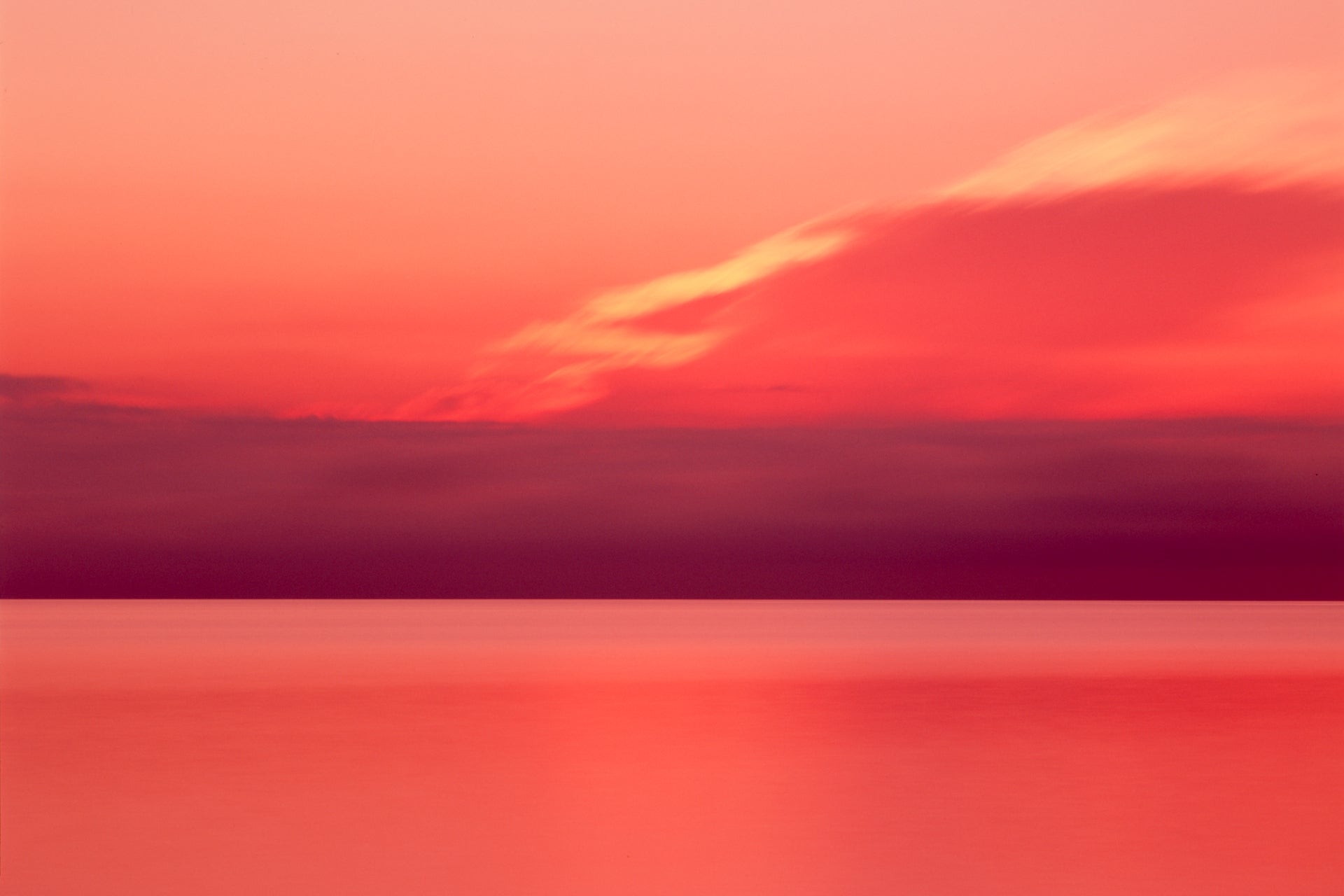 Fine art photographic print of a long exposure of sunrise over cape cod.