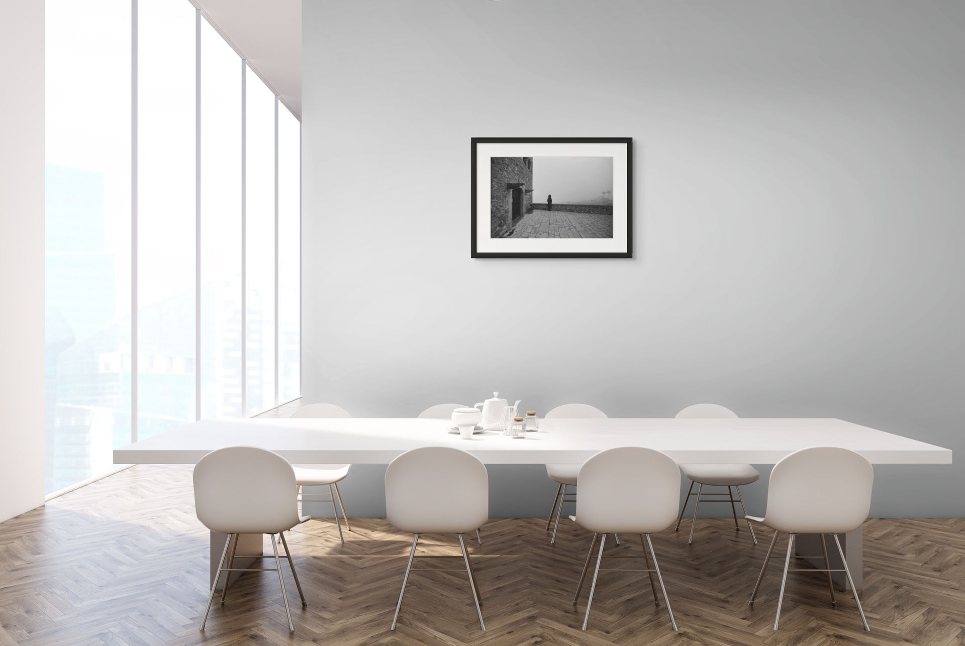 A misty fine art photo print on black and white ilford photo paper set in a modern office scene.